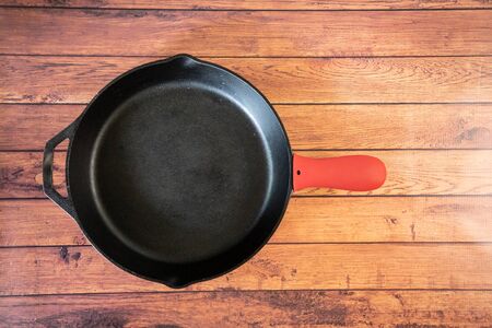 Silicone Hot Skillet Handle Cover Holder - Insulating kitchen accessory protects hands from hot pan handles. heat-resistant silicone creates insulating layer of protection. Oven safe.の写真素材