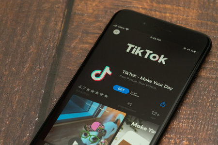 Bogota, Colombia, September, 2019, Tik Tok logo on the phone with the logo at the bottom, Tik Tok...