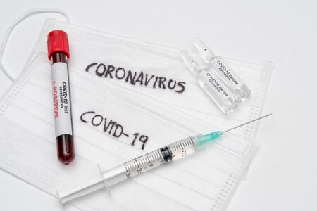 COVID 19 Coronavirus, infected blood sample in the sample tube, Vaccine and syringe injection It use for prevention, immunization and treatment from COVID-19の写真素材