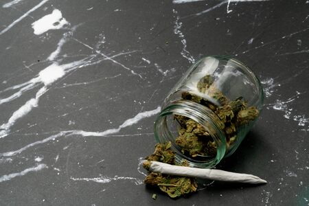 Marijuana cannabis Medicinal, weed joint In a glass container, drugs.の写真素材