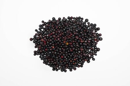 Dark blue small grapes or Vaccinium meridionale, agraz, close up.の写真素材