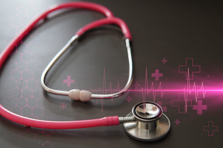 Image of pink stethoscope and heartbeat pulse. medical and healthcare diagnostic concept. Breast cancer awareness, Obstetrician-Gynecologists or OBGYN symbol..の写真素材