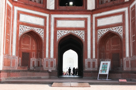 AGRA,INDIA -APRIL 15 : Unidentified tourists at The Great gate (Darwaza-i rauza)gateway to the Taj Mahalon APRIL 15, 2012 in INDIA.のeditorial素材