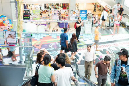BANGKOK - JAN 4: Merchandises and unidentified shoppers Inside  MBK shopping  Center on Jan 4, 2014 in Bangkok, Thailand.のeditorial素材