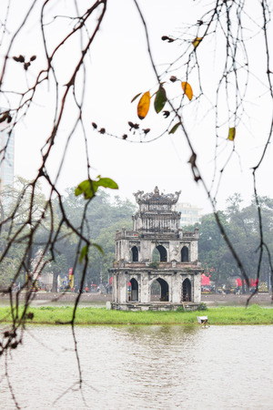 Turtle Tower in a winter at Hoan Kiem Lake, Hanoi, Vietnam.の写真素材
