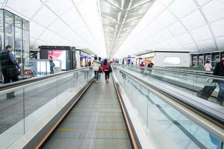 HONG KONG, CHINA - JANUARY 11: Interior of Hongkong airport on January 11, 2015 in Hong Kong, China. The airport is also colloquially known as Chek Lap Kok Airport.のeditorial素材