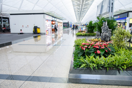 HONG KONG, CHINA - JANUARY 11: Interior of Hongkong airport on January 11, 2015 in Hong Kong, China. The airport is also colloquially known as Chek Lap Kok Airport.のeditorial素材