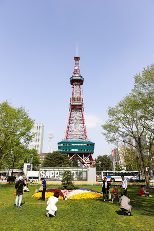 SAPPORO, JAPAN - MAY 6, 2015: Recreation of Japaneses and tourists during Japan Golden week at Sapporo TV Tower located on the ground of Odori Park.のeditorial素材