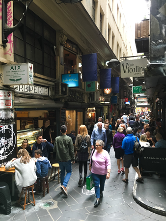 Degraves Street is a laneway that runs between Finders Street and Flinders Lane, near Elizabeth Street. Close to an exit from Flinders Street Station, it is a popular place for people to stop for a coffee or snack before catching a train.のeditorial素材