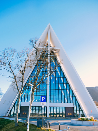 Arctic cathedral in Tromso, Norway in a sunny day with blue sky in autumn - architecture Landmarkの写真素材