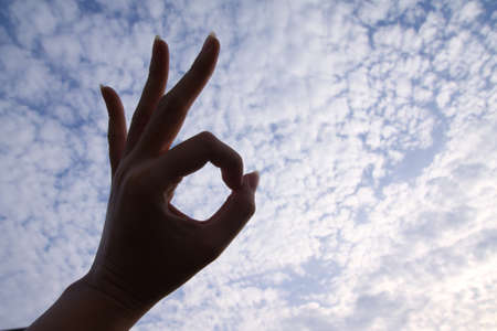 OK hand sign silluateの写真素材