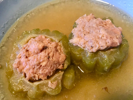 stuffed bell pepper with pork in a bowl, close-upの写真素材