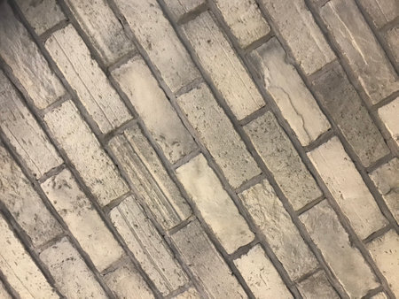 Background of brick wall texture for interior or exterior design with copy space.の写真素材