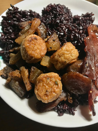 stir-fried pork with black sticky rice, Thai style foodの写真素材
