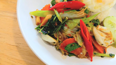 Stir Fried Vegetables with Basil Leaves and Fried Egg Recipeの写真素材