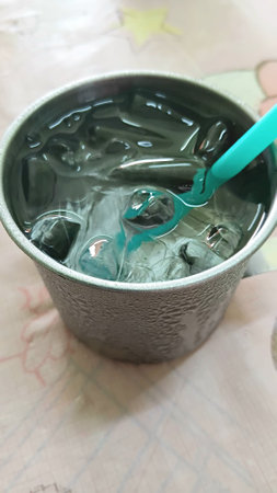 Ice Cold Water in Stainless Steel Cupの写真素材
