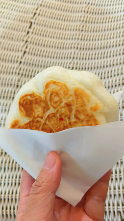 Fried Stuffed Bun on Handの写真素材