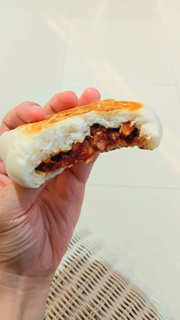 Fried Stuffed Bun on Handの写真素材