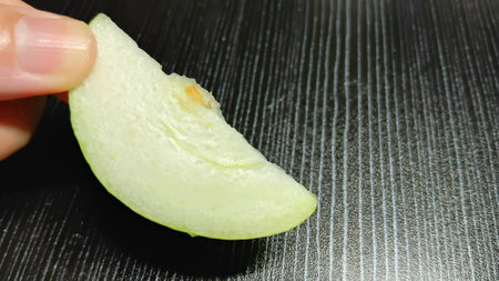Fresh Guava Slice on Handの写真素材