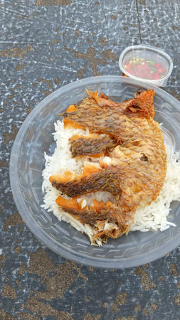 Fried Fish on Rice Recipeの写真素材