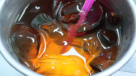 Iced Tea in Stainless Steel Cupの写真素材