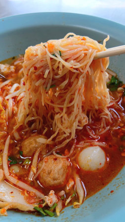 Tom Yum Noodles with Fish Balls Recipeの写真素材