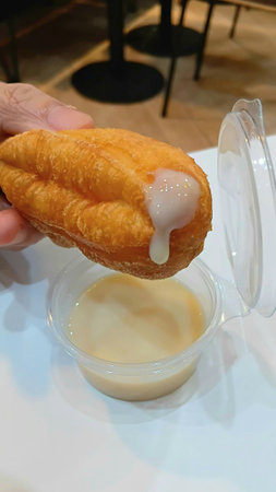 Deep Fried Dough Stick for Eating with Sweetened Condensed Milkの写真素材