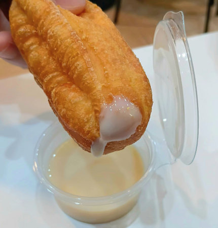 Deep Fried Dough Stick for Eating with Sweetened Condensed Milkの写真素材