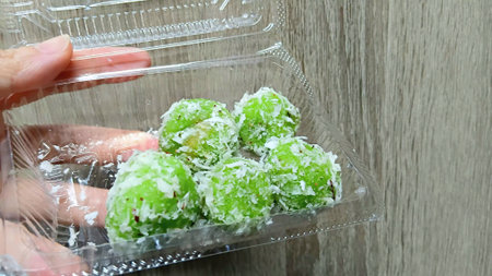 Thai Coconut Balls in Plastic Boxの写真素材