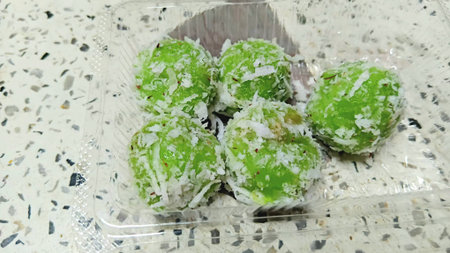Thai Coconut Balls in Plastic Boxの写真素材