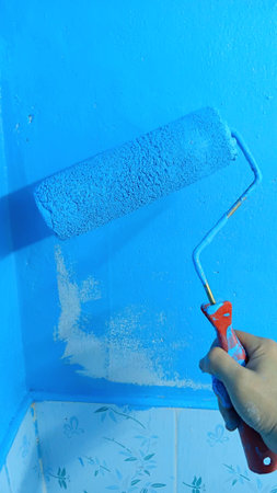 Paint Roller and Light Blue Colorの写真素材