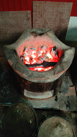 Fire in The Stove for Cookingの写真素材