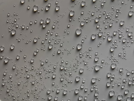 Pattern of water bubbles on white plastic box cover. After put the frozen food box in microwave.
