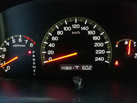 Close up of car console showing speed meter in dashboard while the car stopped in traffic jam.の写真素材