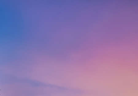 Colorful sky in the evening sunset. Blur gradient blue to purple color. Soft and dramatic.の写真素材