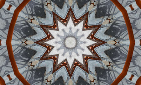 The kaleidoscope of old wall with white cracked paint and small trees grows on it. Under the afternoon sunlight.の写真素材