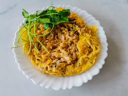 Phadthai, famous Thai style street food. Fried noodle with egg, tofu and shrimp.