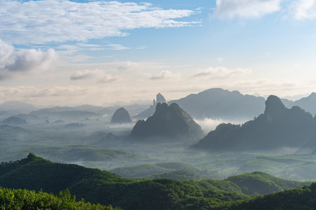 The sun shines through the mountains that swap practice into a beautiful forest.