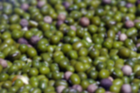 Defocused abstract background of various types of tropical seeds