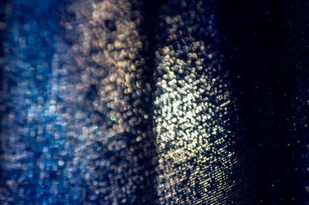 Abstract bright blue bokeh background in shallow focus