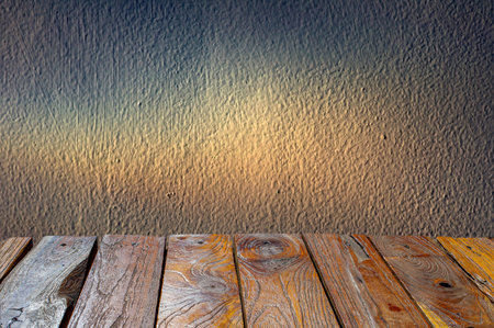 Old teak wood empty table with concrete wall for  background