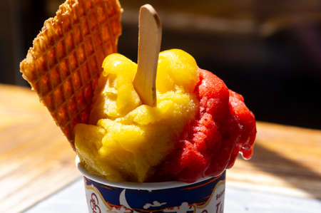 Colorful Ice Cream with wooden spoonの写真素材