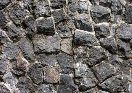 Surface of the stone wall for background and wallpaperの写真素材