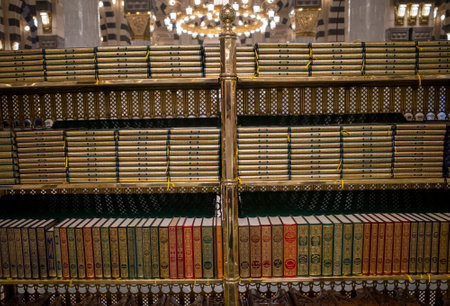 Medina, Saudi Arabia - July 5, 2024: Al-Quran rows lined up neatly in Masjid Nabawi, Prophet Mosque, Medina, Saudia Arabia.の写真素材