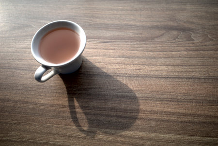 Drinking a cup of hot tea in the afternoon while relaxing.の写真素材