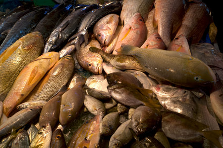 Fresh fish on the ice at traditional market, Pasar Penuin Wet Market in Batam City, Indonesia.