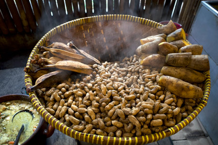 Kacang Rebus, Hot and smoky boiled peanuts in a woven bamboo container.の写真素材