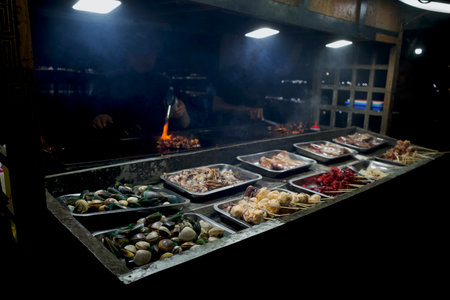 A variety of delicious clams, crab, shrimp, squid at street food carts.の写真素材