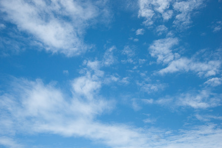 Blue sky with cloudsの写真素材