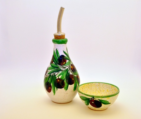 Olive oild dropper with a saucer for olive uvaの写真素材